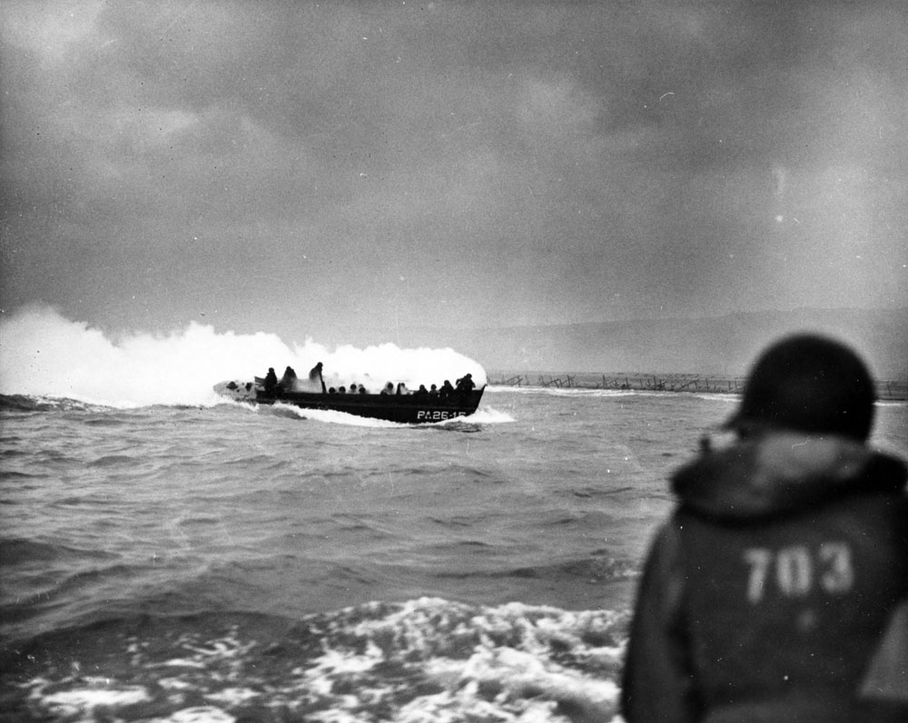 A LCVP landing craft from USS Samuel Chase (APA-26) approaches Omaha Beach on D-Day, 6 June 1944.