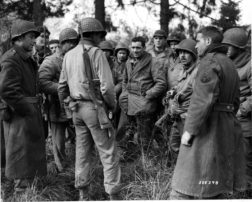 28th Division band and Quartermaster Company regroup in Bastogne.