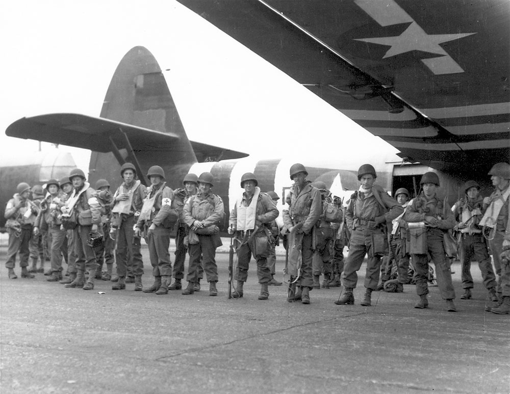 Airborne troops next to gliders