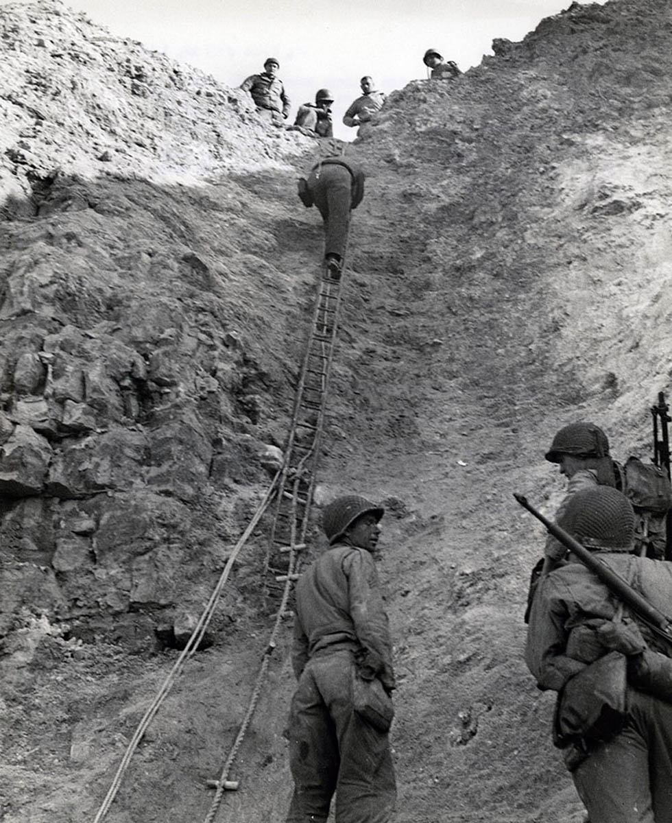 Army Rangers Climb a Rope Ladder at Pointe du Hoc, D-Day +75