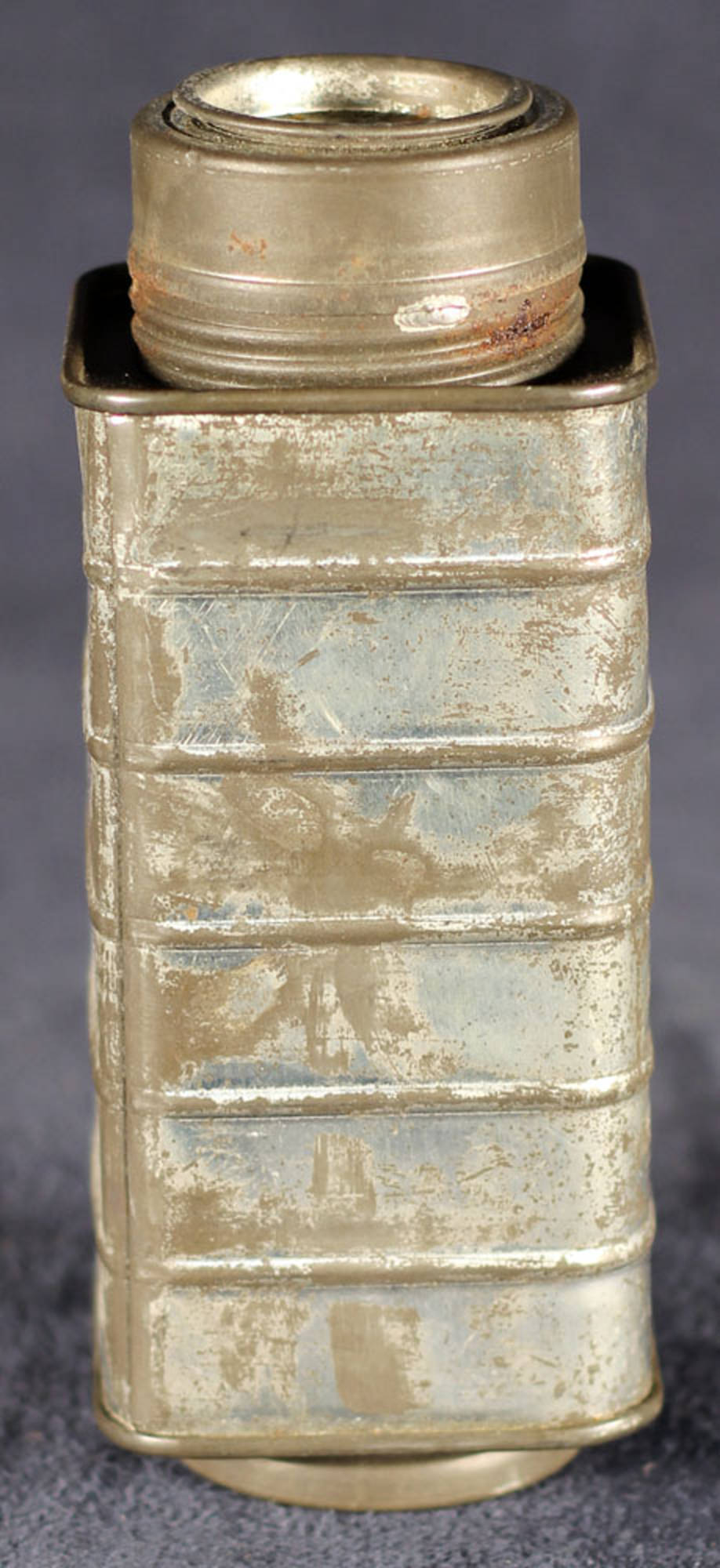 This condiment can is made of tinned iron, and was manufactured to hold coffee, sugar, and salt.