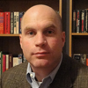 JOHN C. MCMANUS