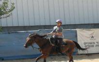 Erin Solaro riding Shimshon, the Horse