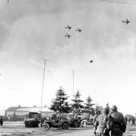 Air-dropped supplies dropping during the Siege of Bastoge.