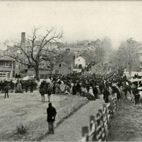 Photograph of the crowd gathering before President Abraham Lincoln's speech dedicating the Soldier's National Cemetery.