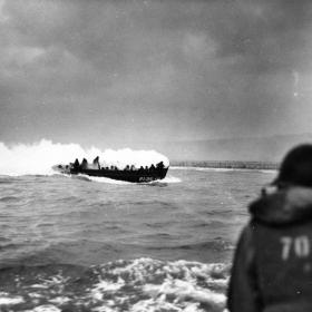 A LCVP landing craft from USS Samuel Chase (APA-26) approaches Omaha Beach on D-Day, 6 June 1944.
