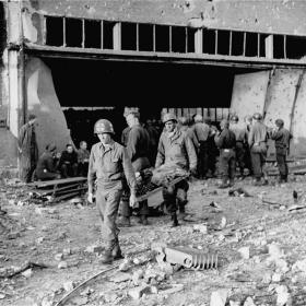 American medics remove survivors from Dora-Mittelbau concentration camp after liberation.