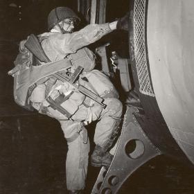 Joseph F Gorence of the 101st Airborne Division boards a C-47 