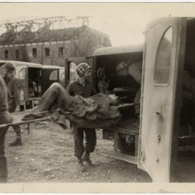 American medical personnel evacuatees Dora-Mittelbau camp suvivors.