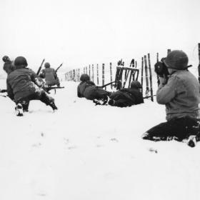 American soldiers patrol outside of Beffe, Belgium