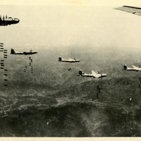 B-29 bomber dropping bombs over Japan