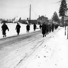 The 101st Airborne Division moving out of Bastogne, Belgium