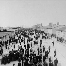 Liberated survivors walk the Main Street at Mauthausen Concentration Camp