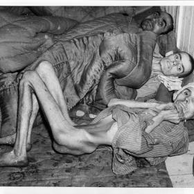 Emaciated survivors from Buchenwald concentration camp. 