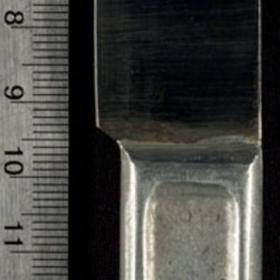Metal knife has "US" and "4B34" stamped onto the top of the handle. On the reverse side are "A.C. Co." and "1917" which indicate the manufacturer, American Cutlery Company and the manufacture date, 1917.
